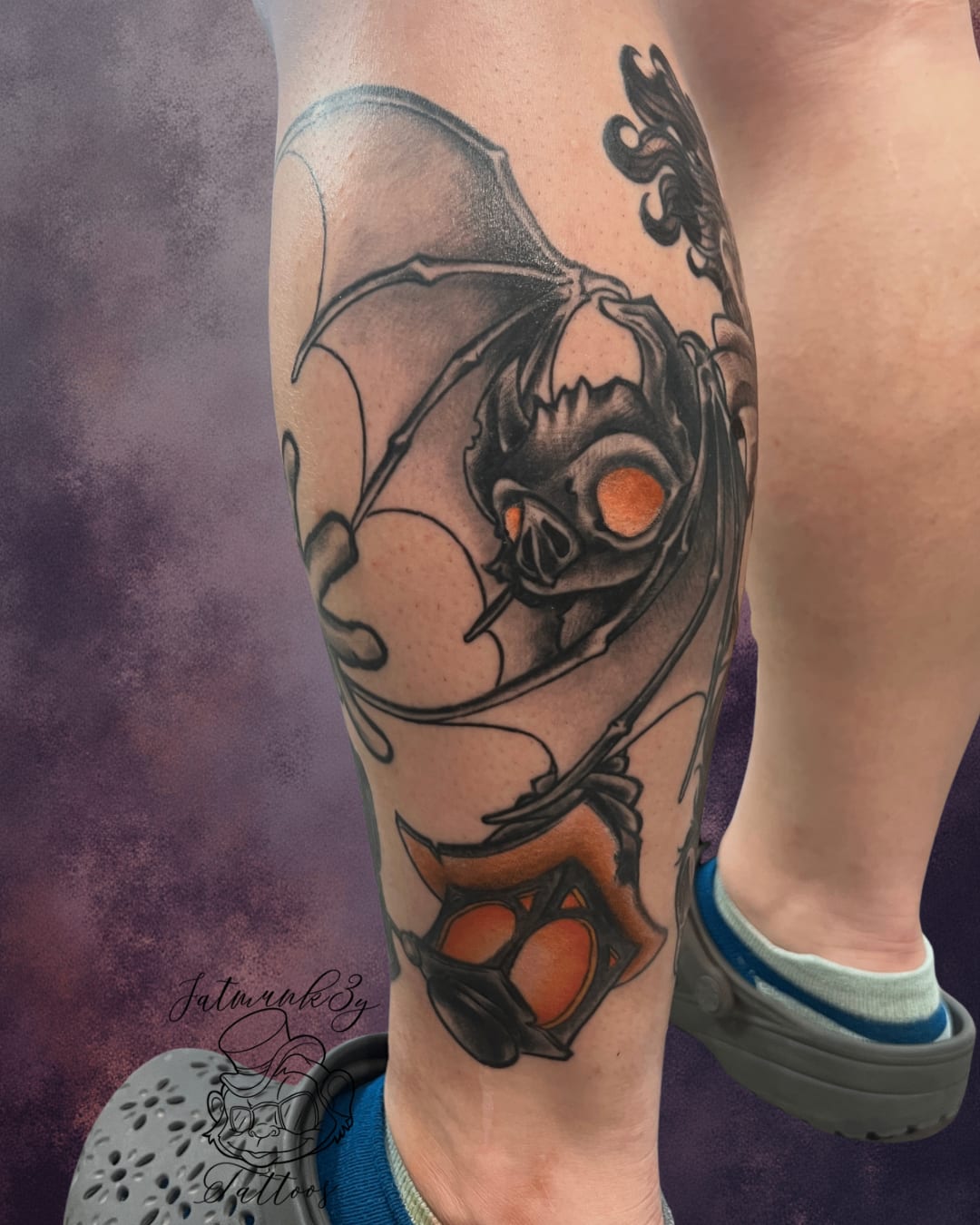 Custom black and grey spooky cute cartoon bat tattoo on leg by Spencer Holmes, Fatmunk3y Tattoos Columbus Ohio