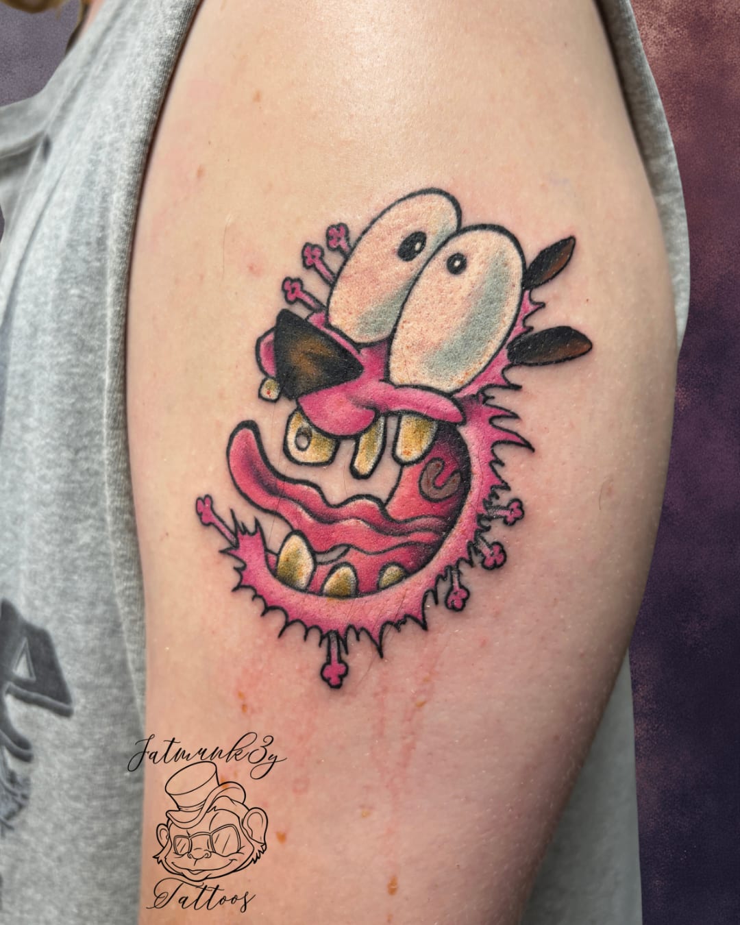 Custom color cartoon Courage the Cowardly Dog tattoo on arm by Spencer Holmes, Fatmunk3y Tattoos Columbus Ohio